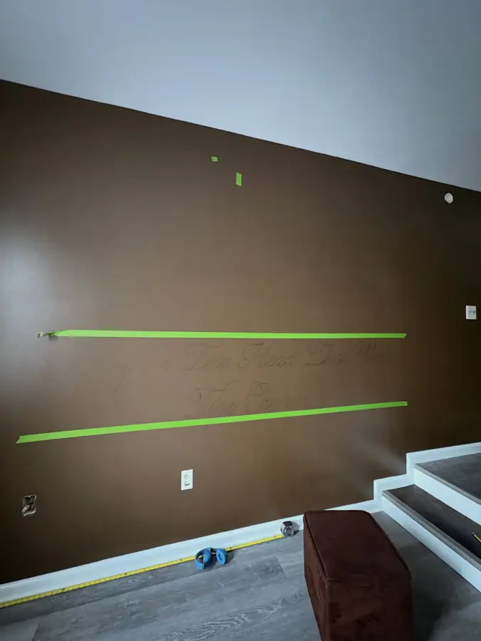 Brown wall with tape lines